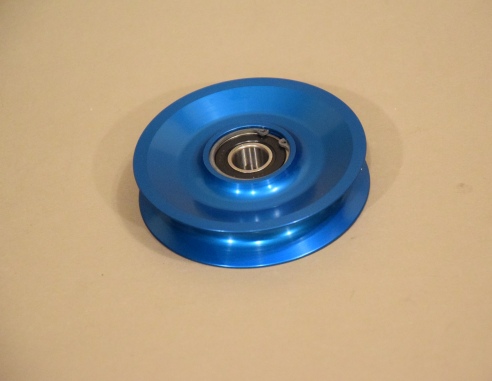 The pulley is CNC machined from 6061 T6 aluminum and las a large double row sealed ball bearing.  The bearing is retained by snap rings for ease of maintenance.
