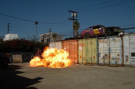 First in a series of 3 photos.  Single popper with Mapp Gas Cylinder.  For scale, the containers behind are 8 feet high and 8 feet wide, giving an initial fireball of about 12 feet high and 16 feet wide.