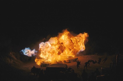 One of the Fast and Furiouses.  Blew up 4 cars at a time. Note the blue fire cloud in the left frame. A gallon of Roger George blue fire fluid in a plastic bottle with a wrap of det cord. 
