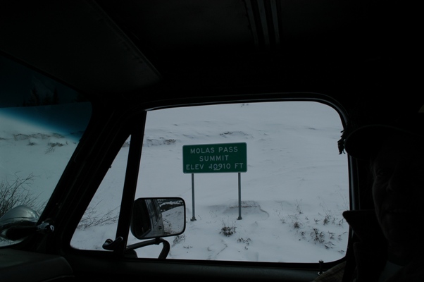 Over Molas Pass in in the Colorado Rockies in a snowstorm.   Tire chains on the rear tires. April 2013